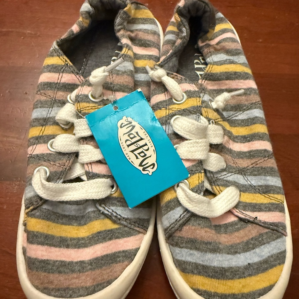 Vibrant Pink and Yellow Slip-On Sneakers with Stripes